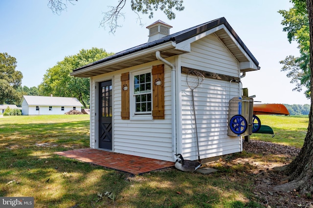 view of outbuilding with an outdoor structure