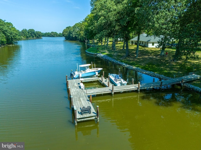 view of dock with a water view and boat lift