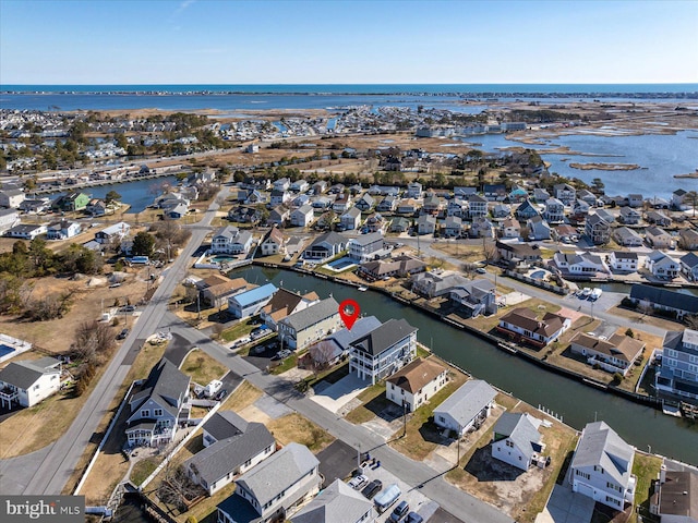 aerial view featuring a residential view and a water view