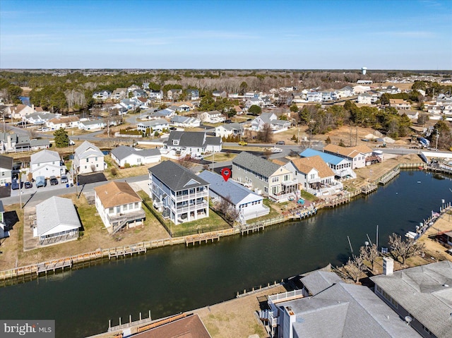 aerial view featuring a residential view and a water view