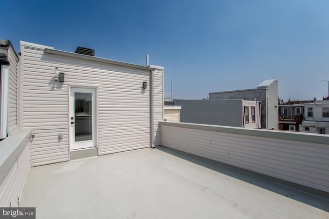 view of patio featuring a balcony