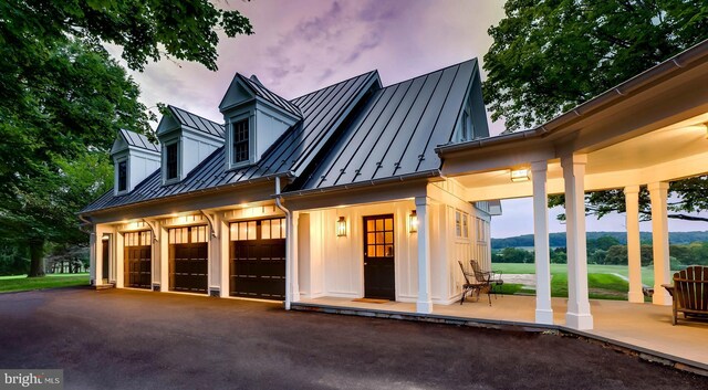 13401 Longnecker Rd, Reisterstown, MD 21136 - exterior space with a garage, a standing seam roof, metal roof, and aphalt driveway