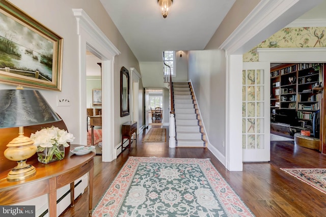 13401 Longnecker Rd, Reisterstown, MD 21136 - entrance foyer with a baseboard radiator, stairs, baseboards, and wood finished floors