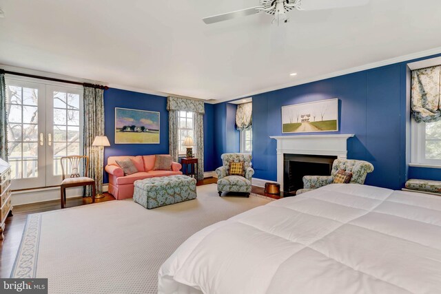 13401 Longnecker Rd, Reisterstown, MD 21136 - bedroom featuring baseboards, ornamental molding, wood finished floors, french doors, and a fireplace