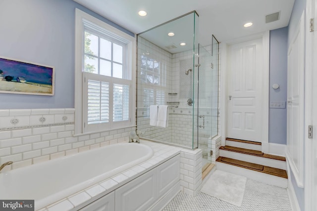 13401 Longnecker Rd, Reisterstown, MD 21136 - bathroom with plenty of natural light, a shower stall, visible vents, and a garden tub