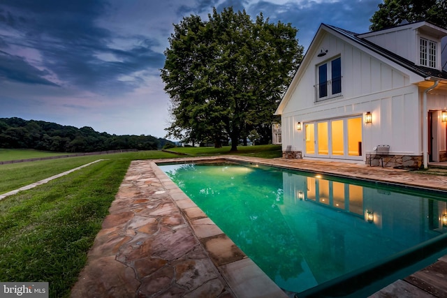 13401 Longnecker Rd, Reisterstown, MD 21136 - pool at dusk featuring a patio area, an outdoor pool, and a yard