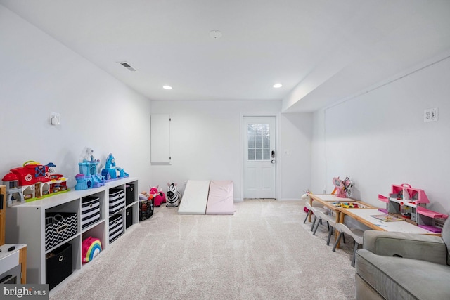 recreation room with visible vents, recessed lighting, and carpet