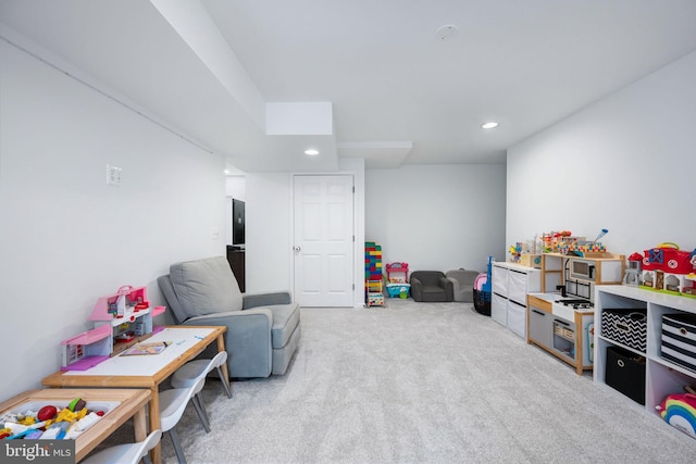 recreation room with recessed lighting and carpet floors