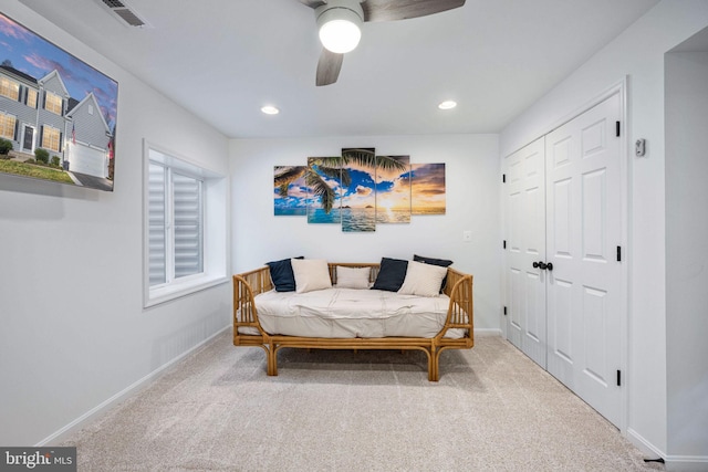 carpeted bedroom featuring a closet, visible vents, recessed lighting, and baseboards