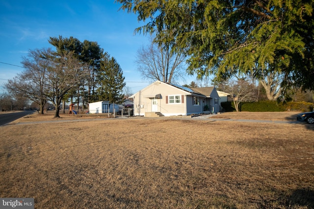 exterior space with a yard