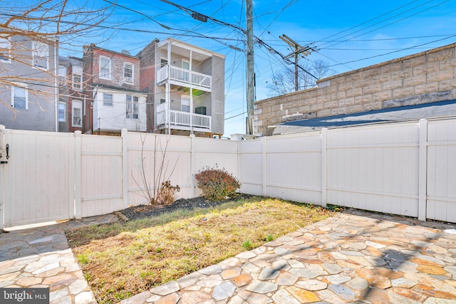 view of yard featuring a fenced backyard and a patio