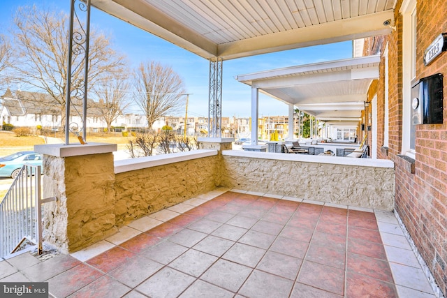 view of patio with a balcony