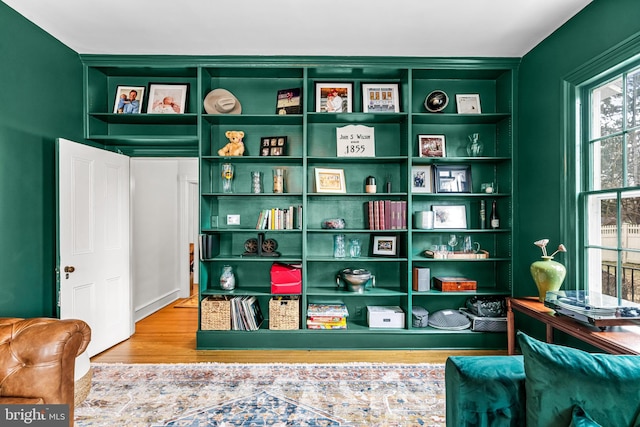 sitting room featuring wood finished floors