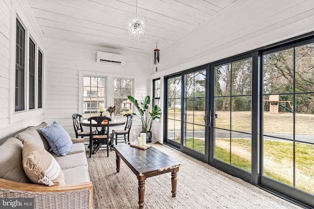 sunroom with wood ceiling, a chandelier, and an AC wall unit