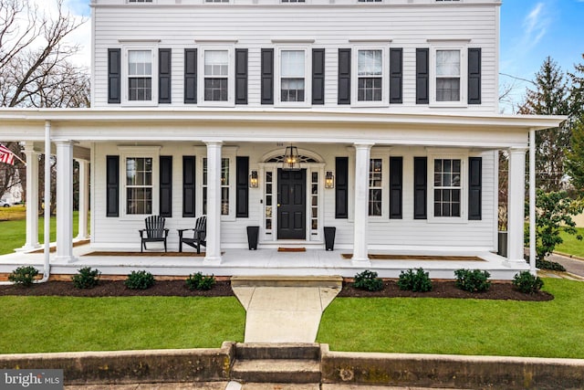 view of front of home featuring covered porch