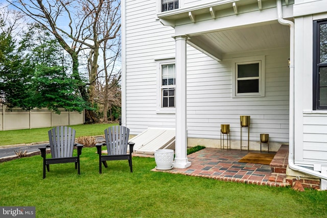 exterior space with a patio area and fence