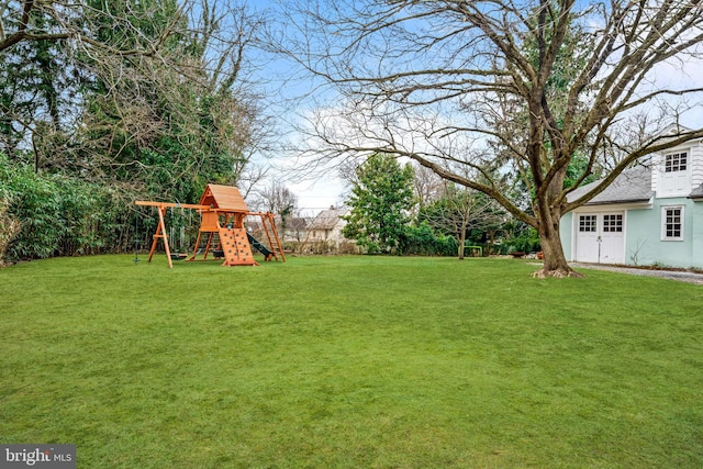 view of yard featuring a playground