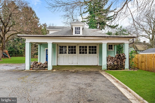 garage with fence