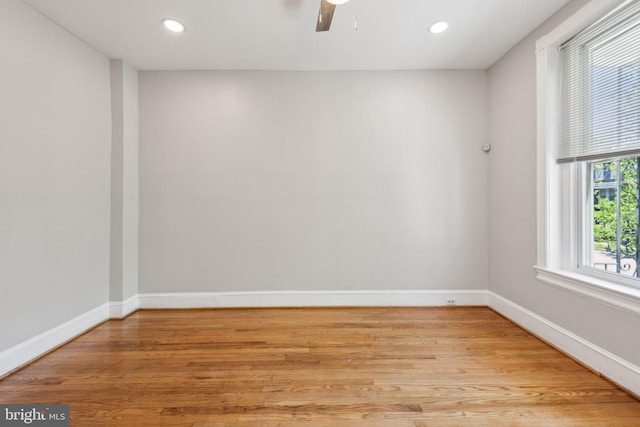 1306 E St NE, Washington, DC 20002 - empty room with light wood finished floors, baseboards, recessed lighting, and a ceiling fan