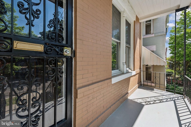 1306 E St NE, Washington, DC 20002 - property entrance featuring brick siding and a porch
