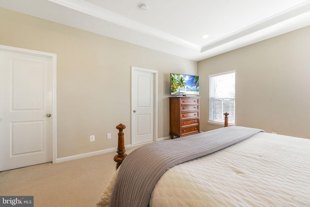 bedroom featuring carpet, baseboards, a tray ceiling, and recessed lighting