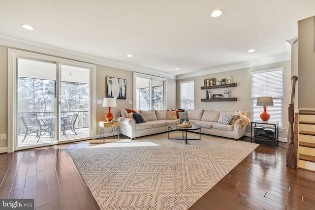 living area featuring dark wood-style floors, crown molding, and recessed lighting