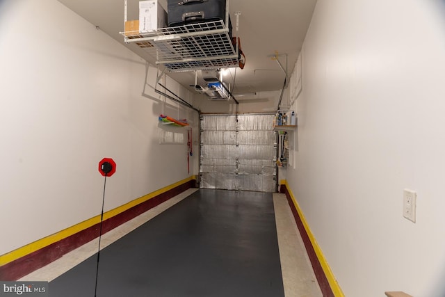 garage featuring baseboards