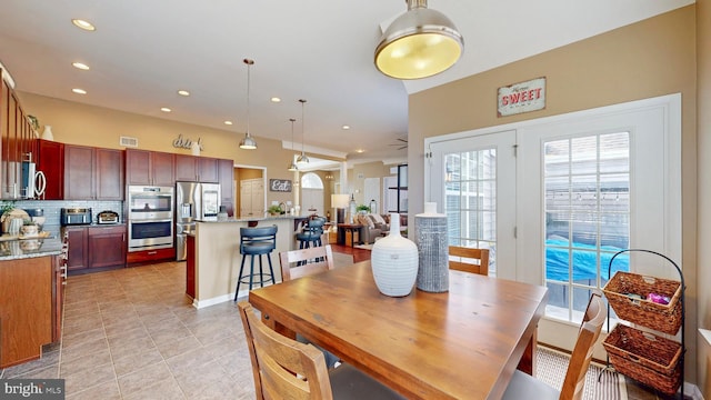 dining room featuring light tile patterned floors, recessed lighting, and visible vents