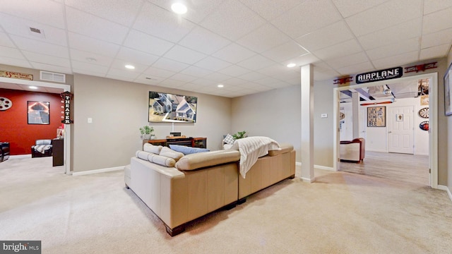 living area featuring recessed lighting, baseboards, visible vents, and light carpet