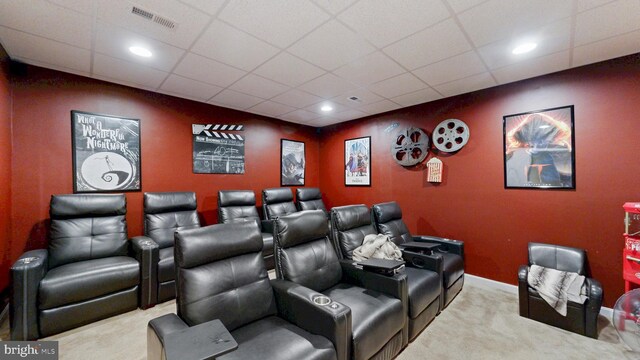 carpeted home theater room featuring recessed lighting, baseboards, visible vents, and a drop ceiling