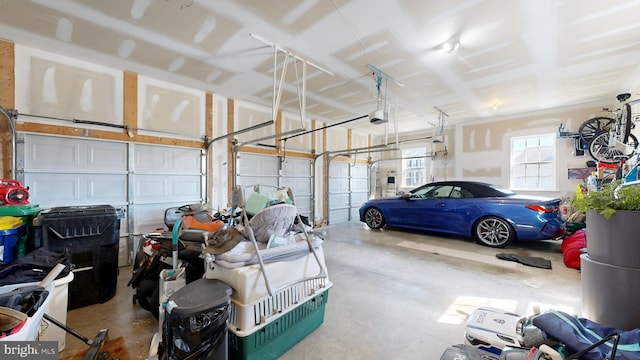 garage featuring a garage door opener