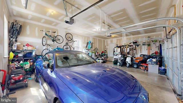 garage featuring a garage door opener