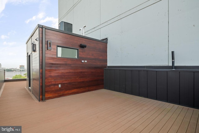 wooden terrace with central AC unit