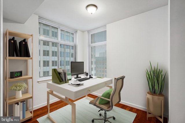 office featuring wood finished floors and baseboards