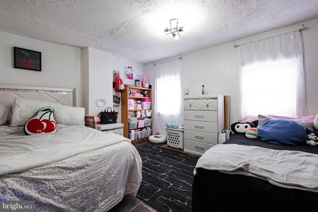 bedroom with a textured ceiling