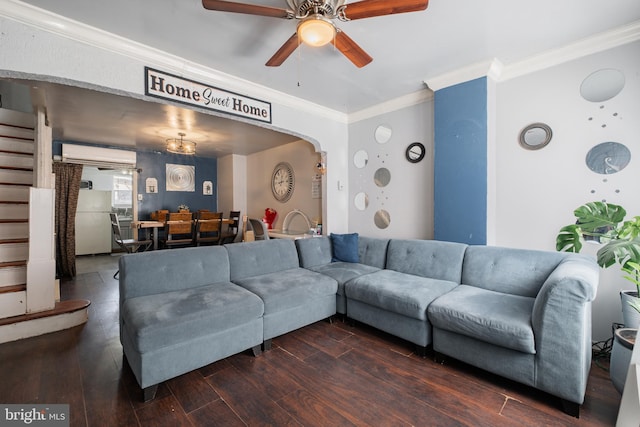 living room with arched walkways, wood finished floors, stairs, ornamental molding, and a wall mounted AC