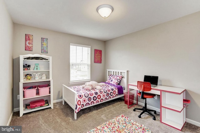 carpeted bedroom with baseboards