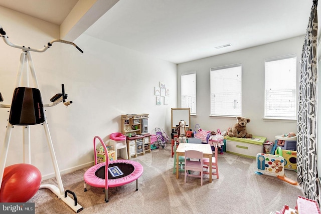 playroom featuring carpet and visible vents