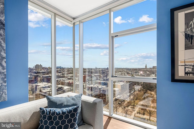 sunroom with a city view