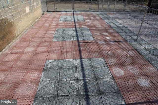 view of patio / terrace with a gate and fence