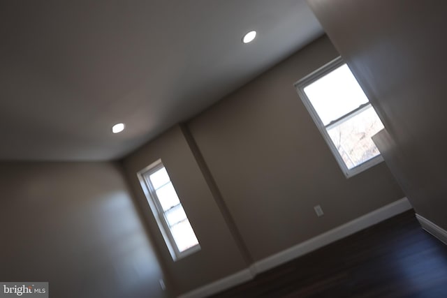 details with recessed lighting, baseboards, and wood finished floors