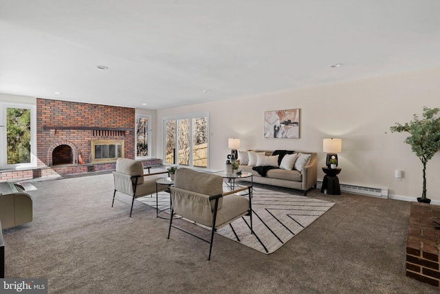 carpeted living room with a baseboard heating unit, recessed lighting, a brick fireplace, and baseboards