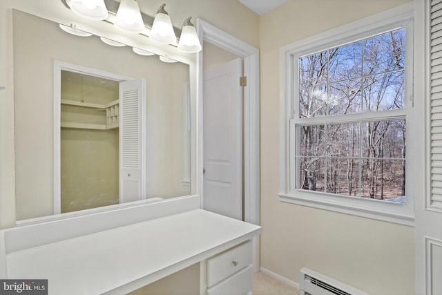 interior space featuring a baseboard radiator and baseboards