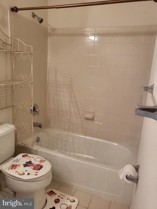 full bath featuring tile patterned flooring, toilet, and shower / bath combination