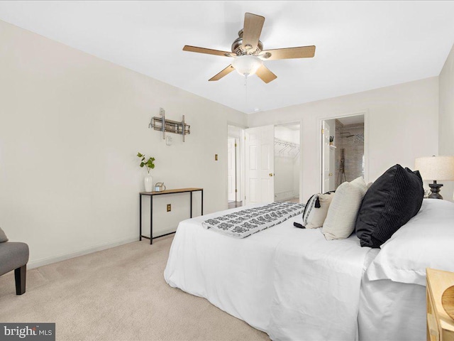 bedroom featuring light colored carpet, baseboards, and ceiling fan