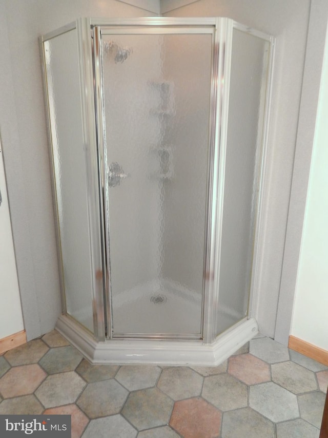 bathroom with a stall shower