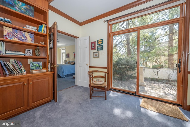 doorway to outside with ornamental molding