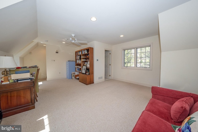 interior space with light carpet, baseboards, vaulted ceiling, and recessed lighting