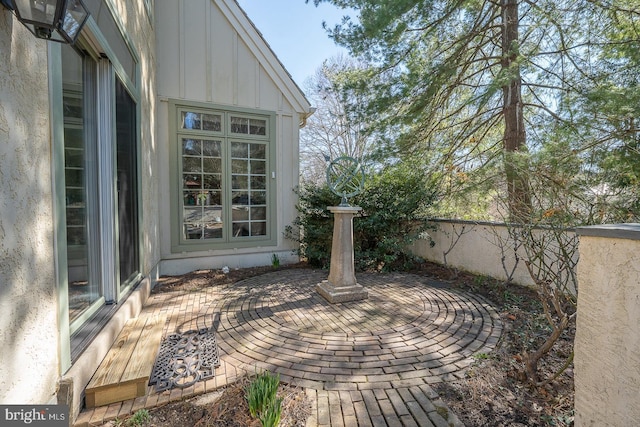 view of patio / terrace featuring fence