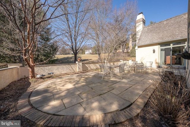 view of patio / terrace featuring outdoor dining space and a fenced backyard